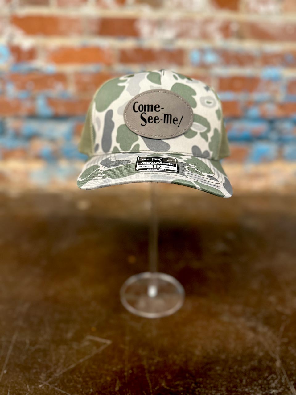 Come-See-Me-Festival-Souveniers-Hats-Camo-Hat-Front